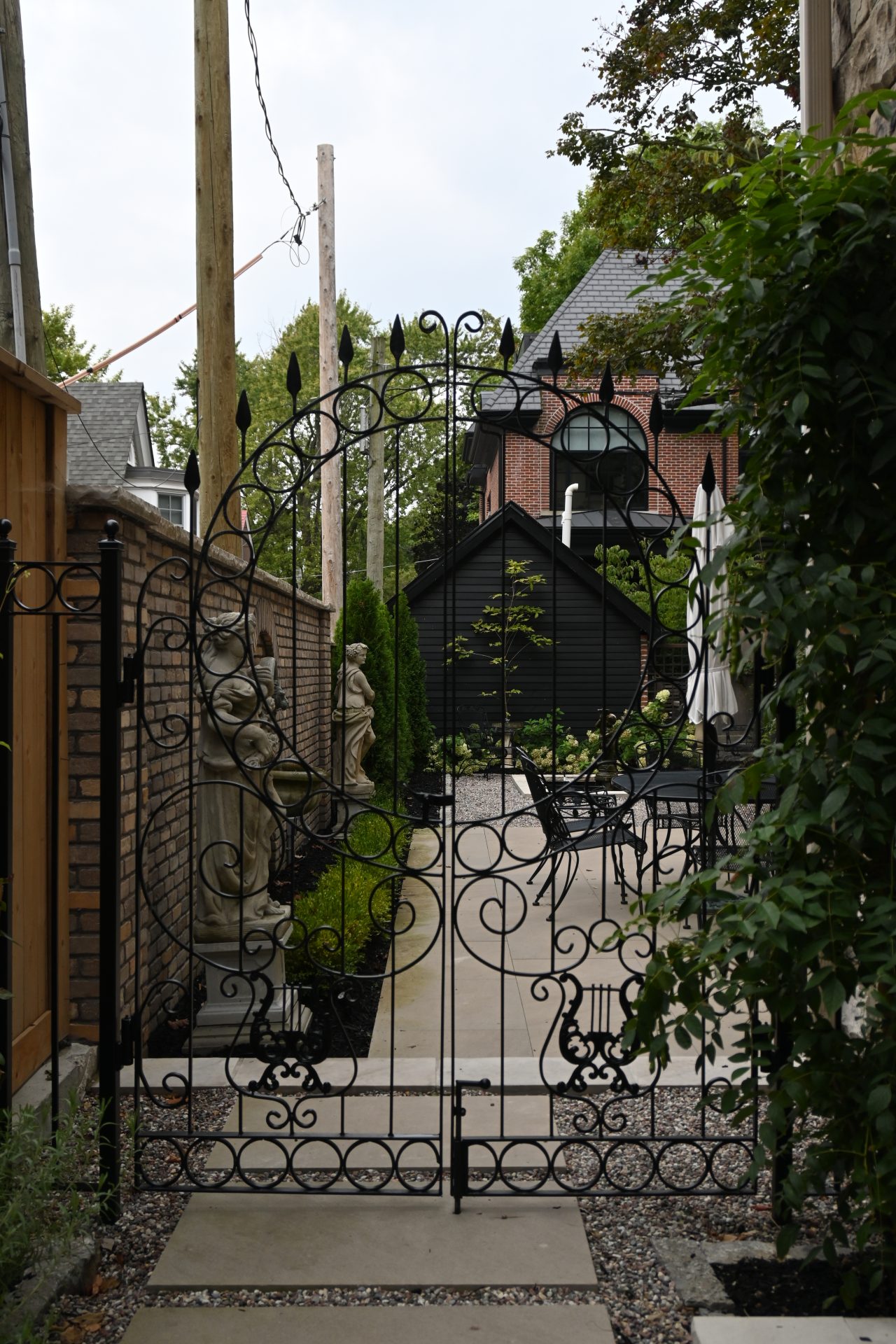 Wrought iron gate to garden courtyard