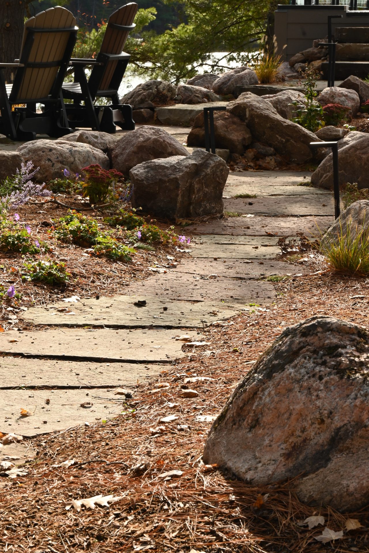 Stone path with chairs and garden view