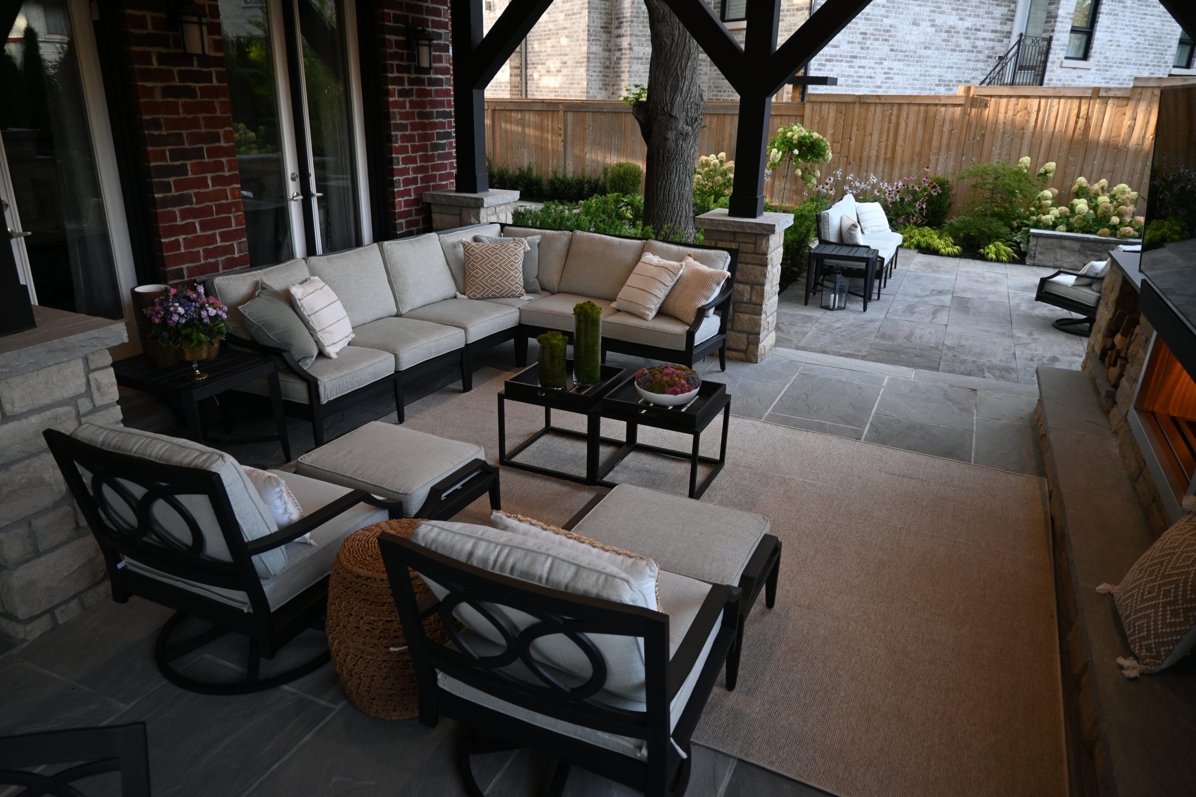 Cozy outdoor patio with furniture and plants