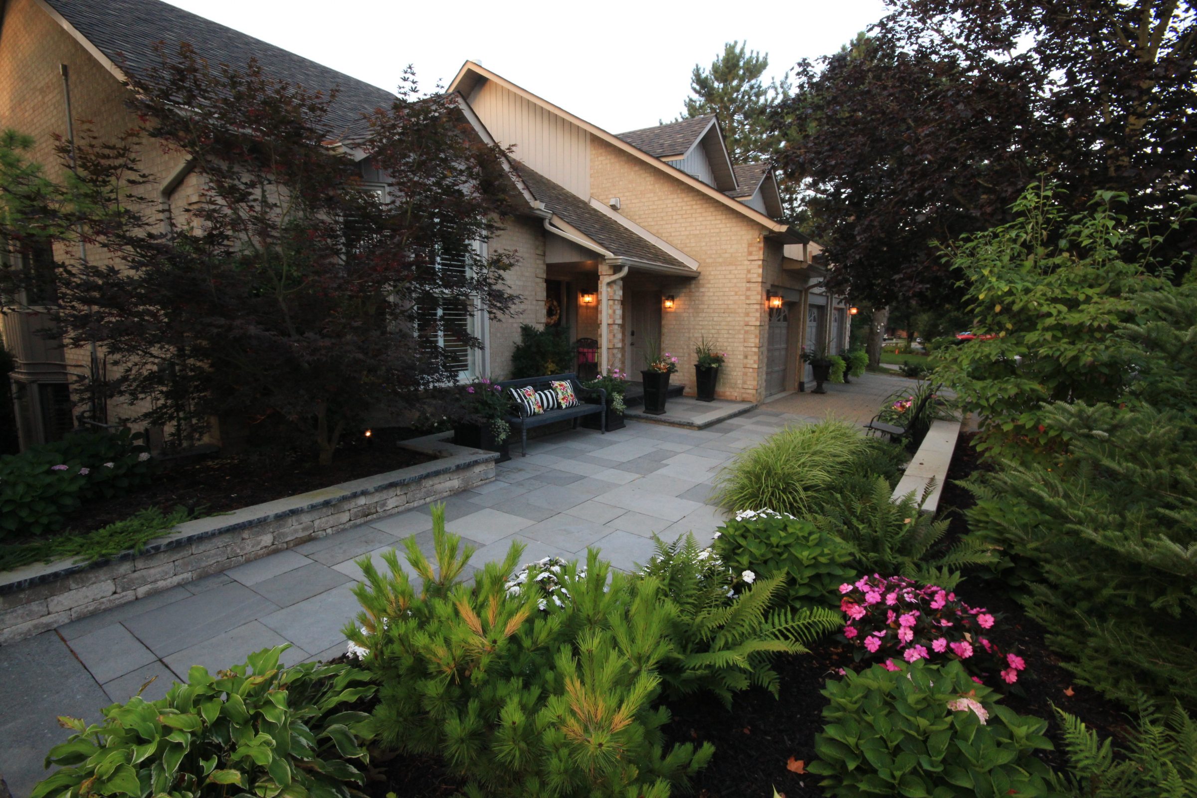 Beautiful house with lush garden landscape