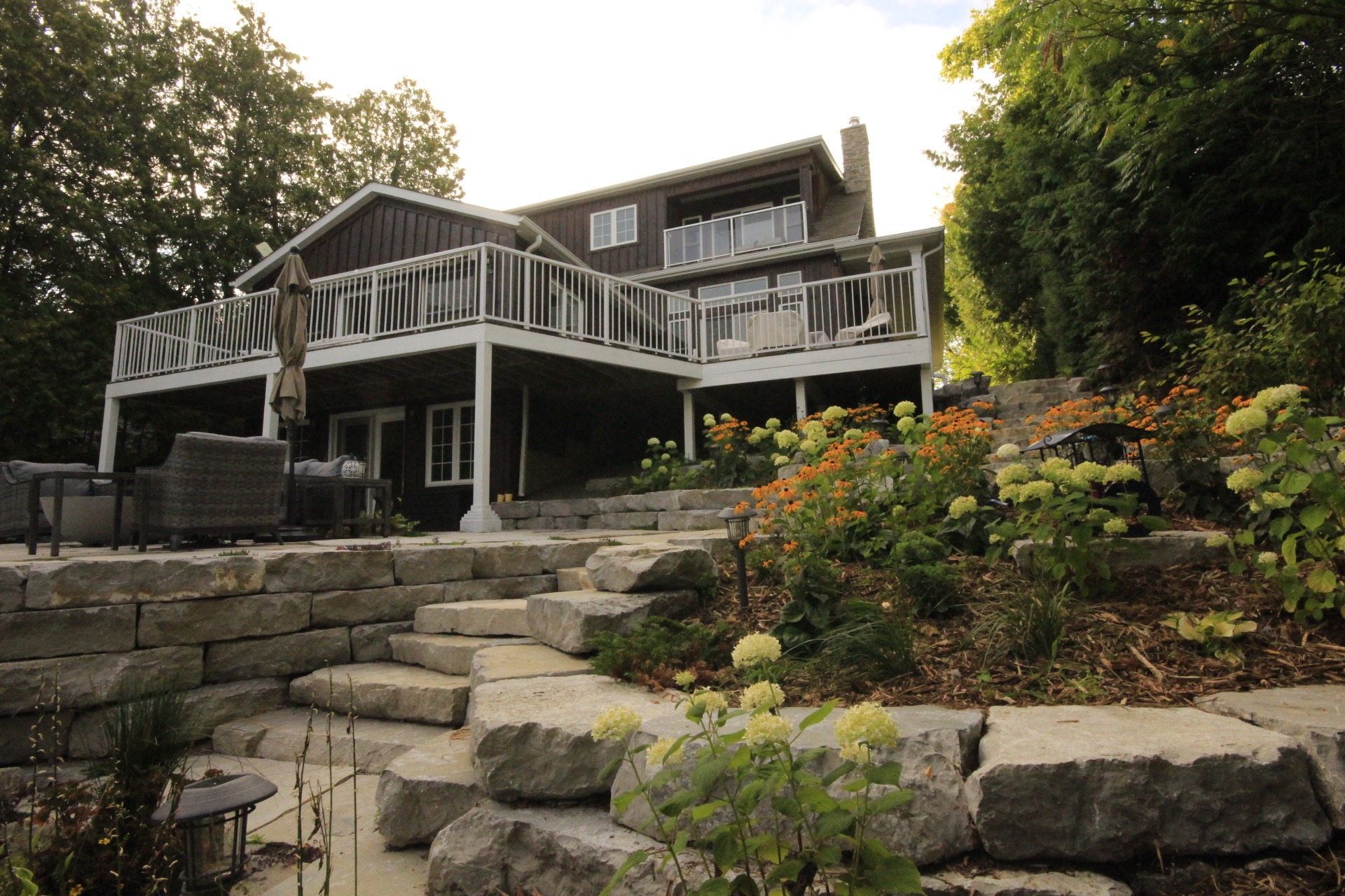 House with garden and stone steps