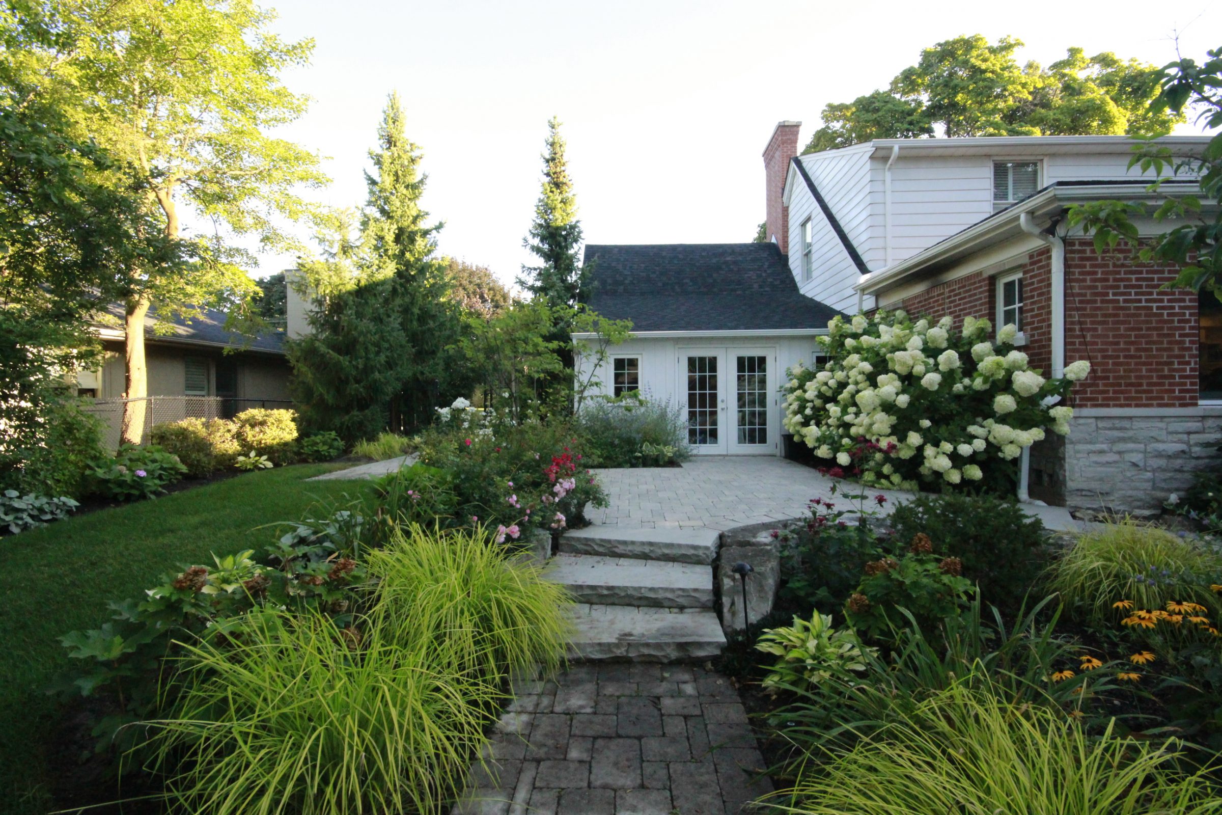 Charming garden path to a cozy house.