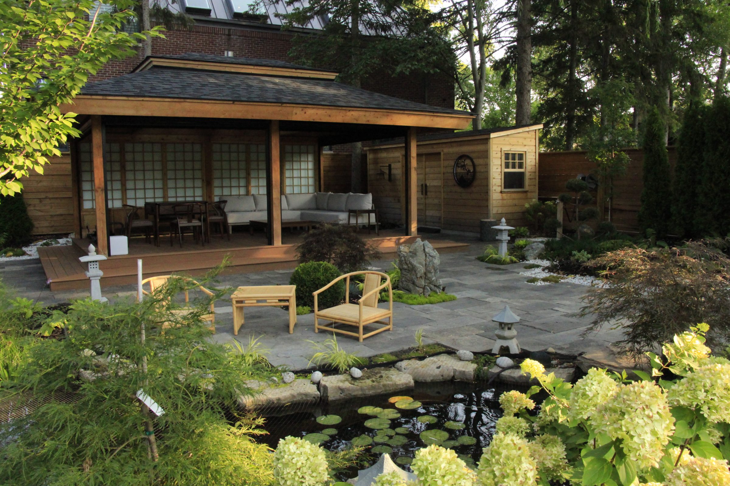 Peaceful Japanese garden with pond and pavilion.