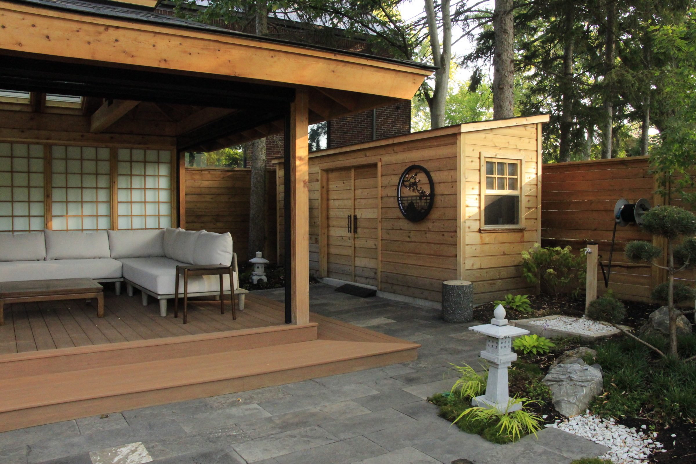 Japanese-inspired outdoor patio with wooden structure
